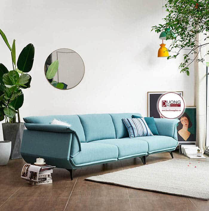 Sofa màu xanh mát thể hiện đặc trưng phong cách Tropical